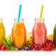 A row of healthy fresh fruit smoothies for hair nutritional needs