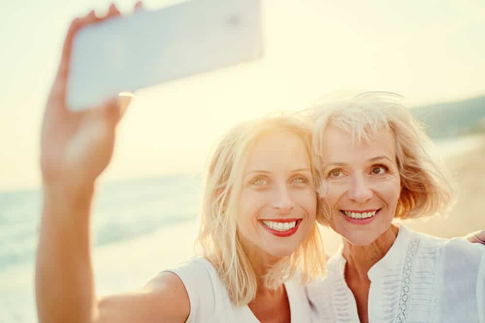 Smiling Women Taking A Selfie