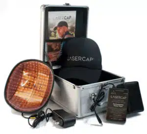 The lower level laser therapy usercap is in a case with other items.