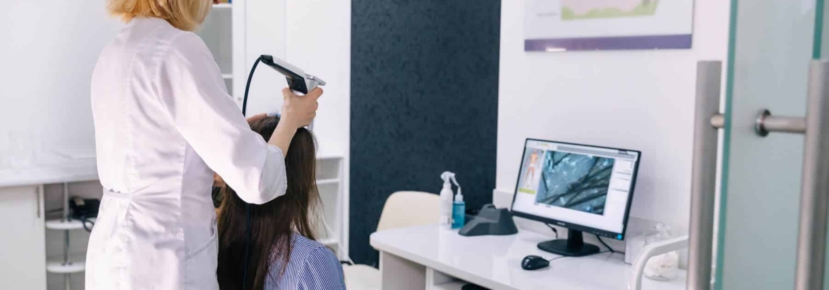Woman Receiving Hair Scan