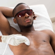 Man Receiving Laser Hair Removal On His Chest Scaled