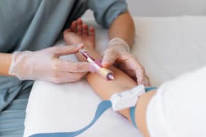 Venipuncture by a health professional