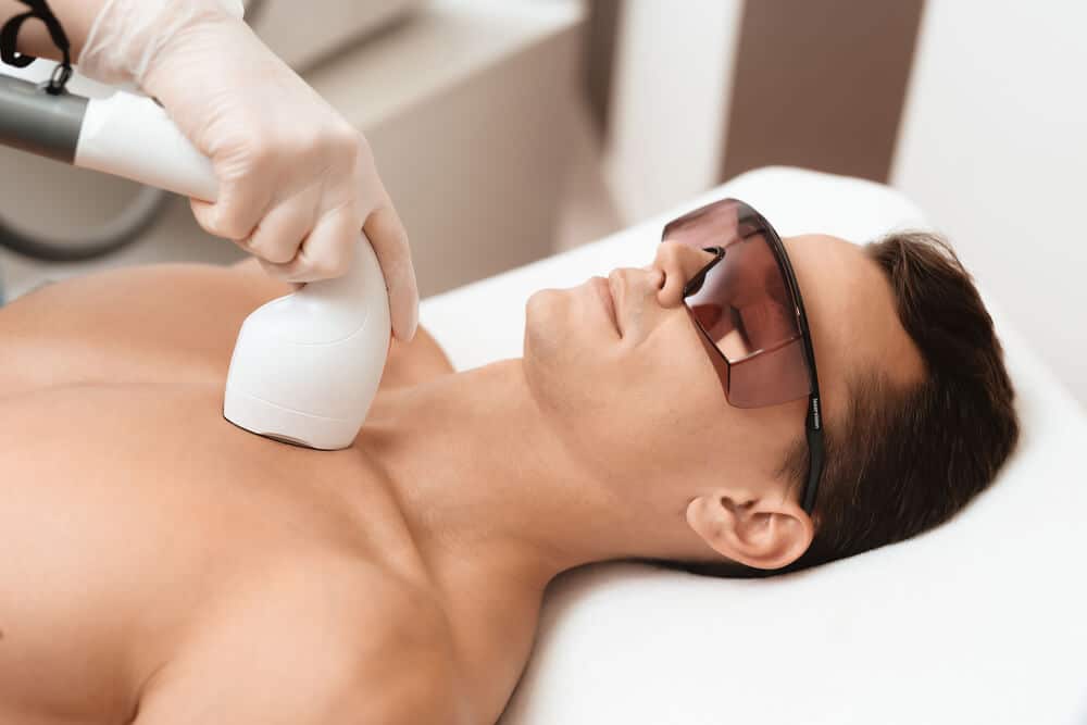Man Receiving Laser Hair Removal On His Chest
