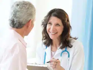 A female doctor having a consultation with a male patient.