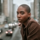 A woman looking at the camera with very short pixie-cut hair